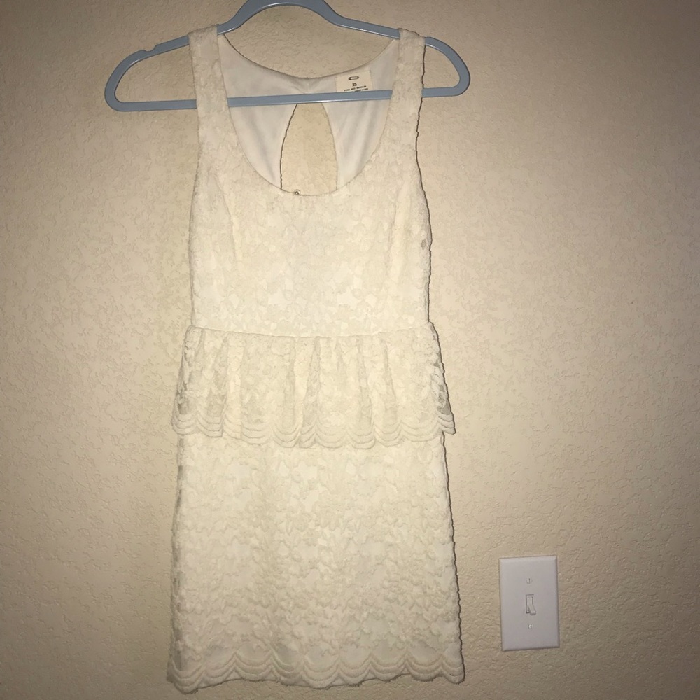 Ivory peplum lace dress